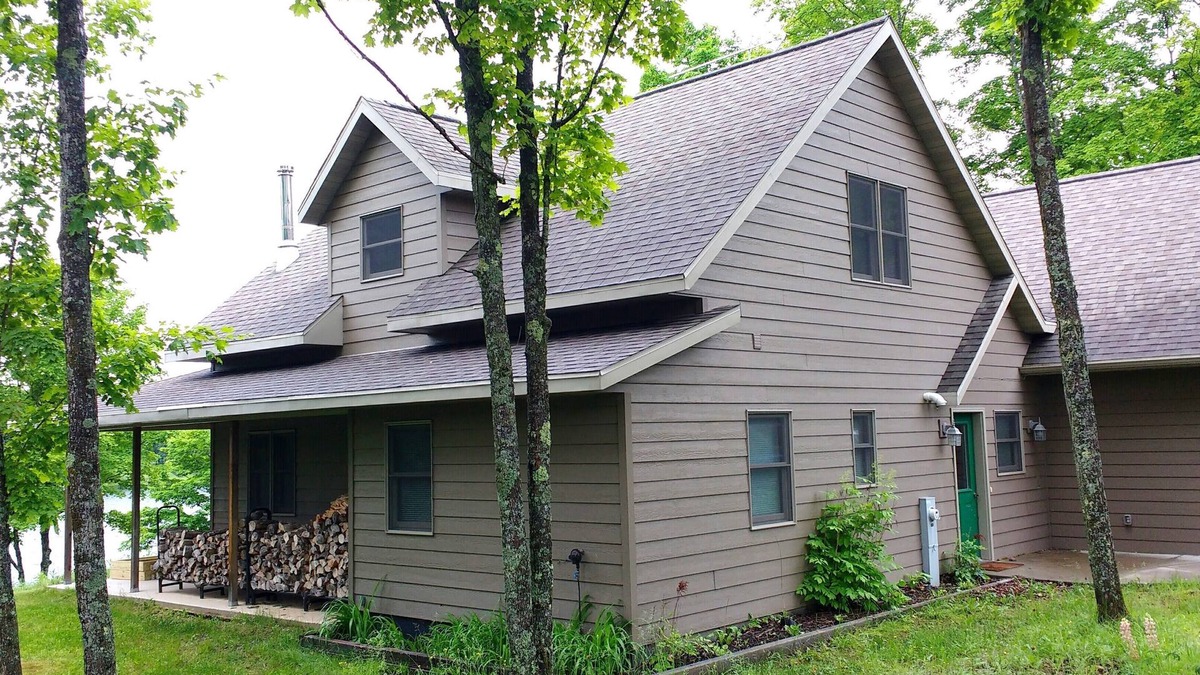Iron River House | Beautiful newer home on the sunny side of peaceful Camp Lake in Iron River
