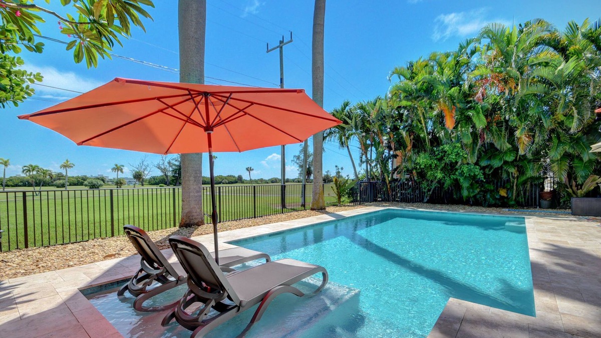 Parrot Cove House | Beautiful Pool home on Golf Course, with Intracoastal views, 1 mile to the Beach
