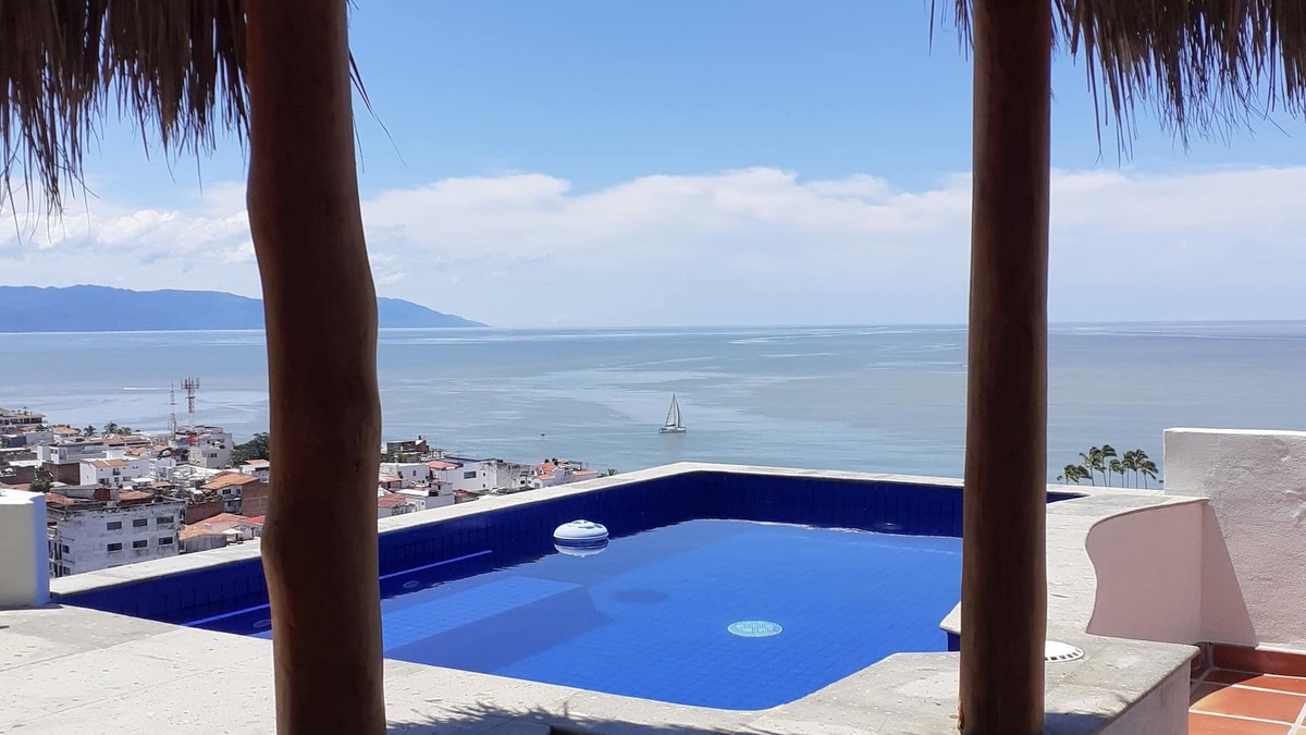 Downtown Puerto Vallarta Apartment | Beautiful view from penthouse suite. Pool, terrace, bar.