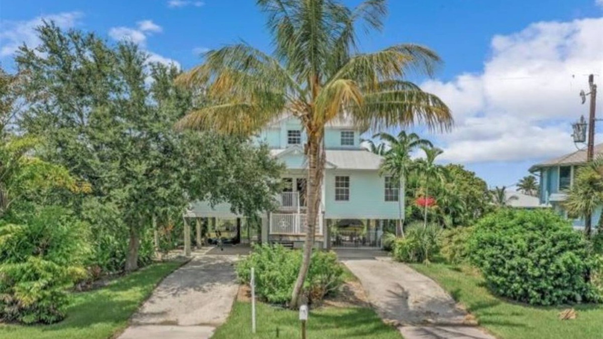 Pine Island Center House | Beautiful waterfront Key West style home with a pool