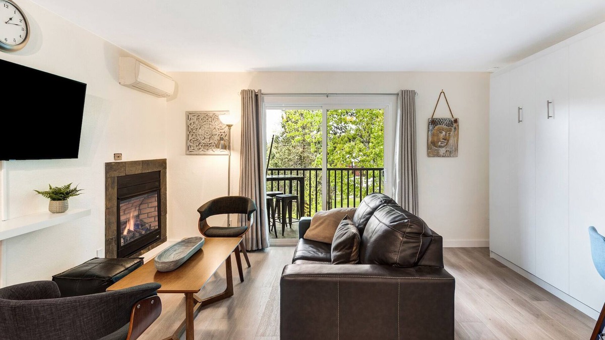 Orchard District Condo | Beautifully Remodeled top floor condo with two balconies, a fireplace and BBQ!