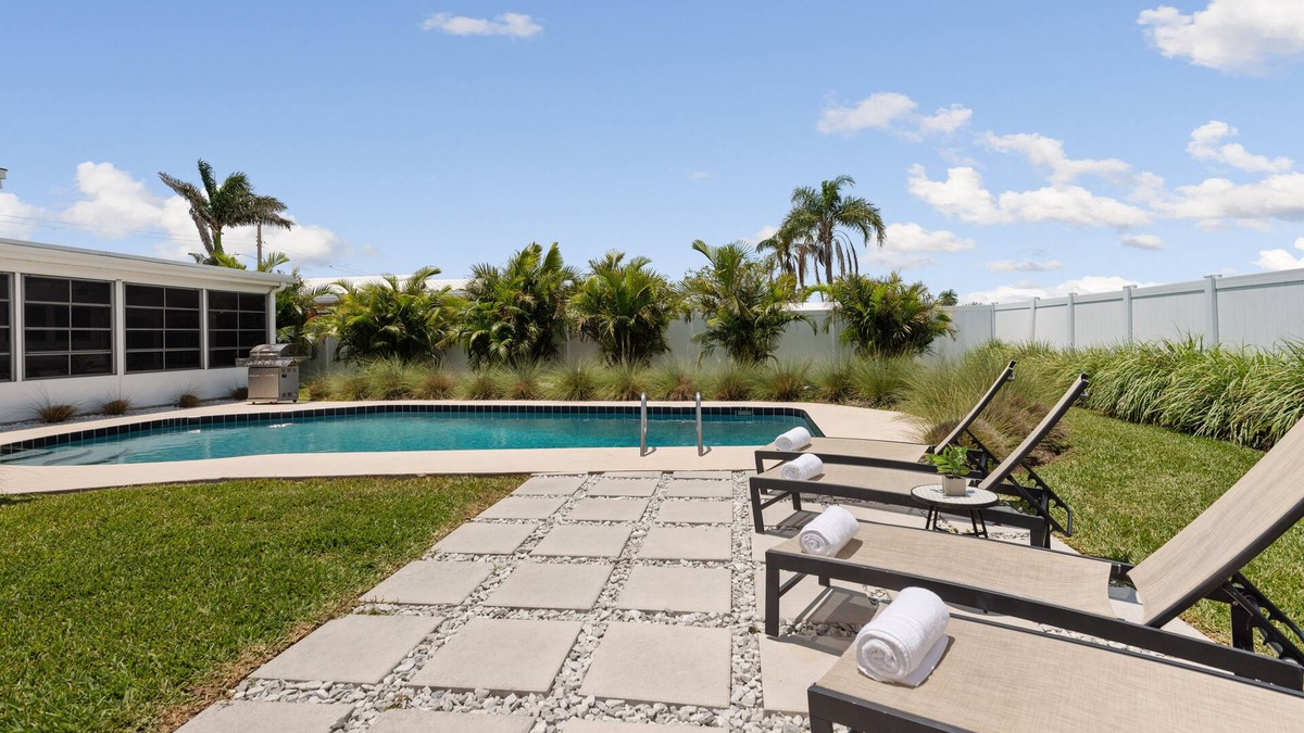Venetian Way House | Beautifully renovated pool home - walking distance to the beach