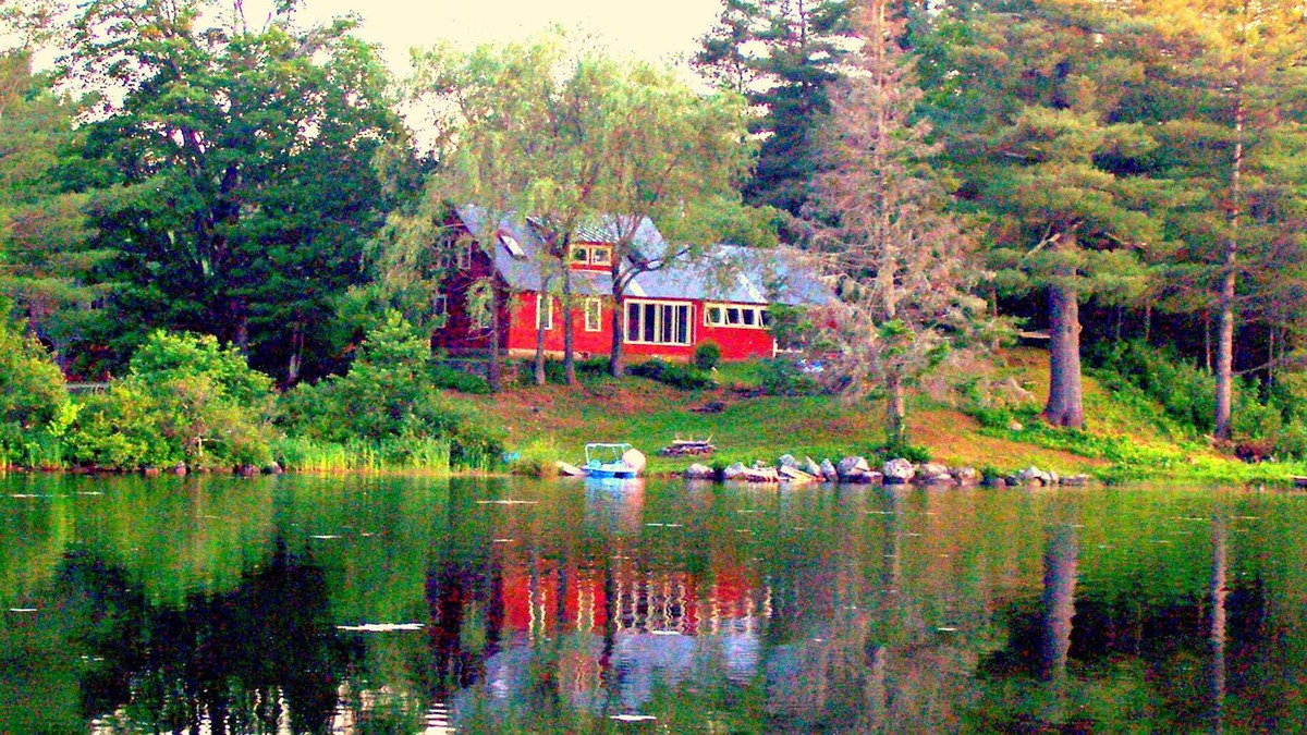 Cabot House | Beautifully renovated antique farmhouse on pristine lake.