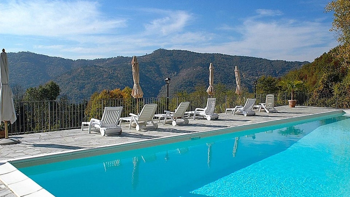 Pezzolo Valle Uzzone Apartment | Beautifully Restored Apartment in Farmhouse with Swimming Pool and Woodland