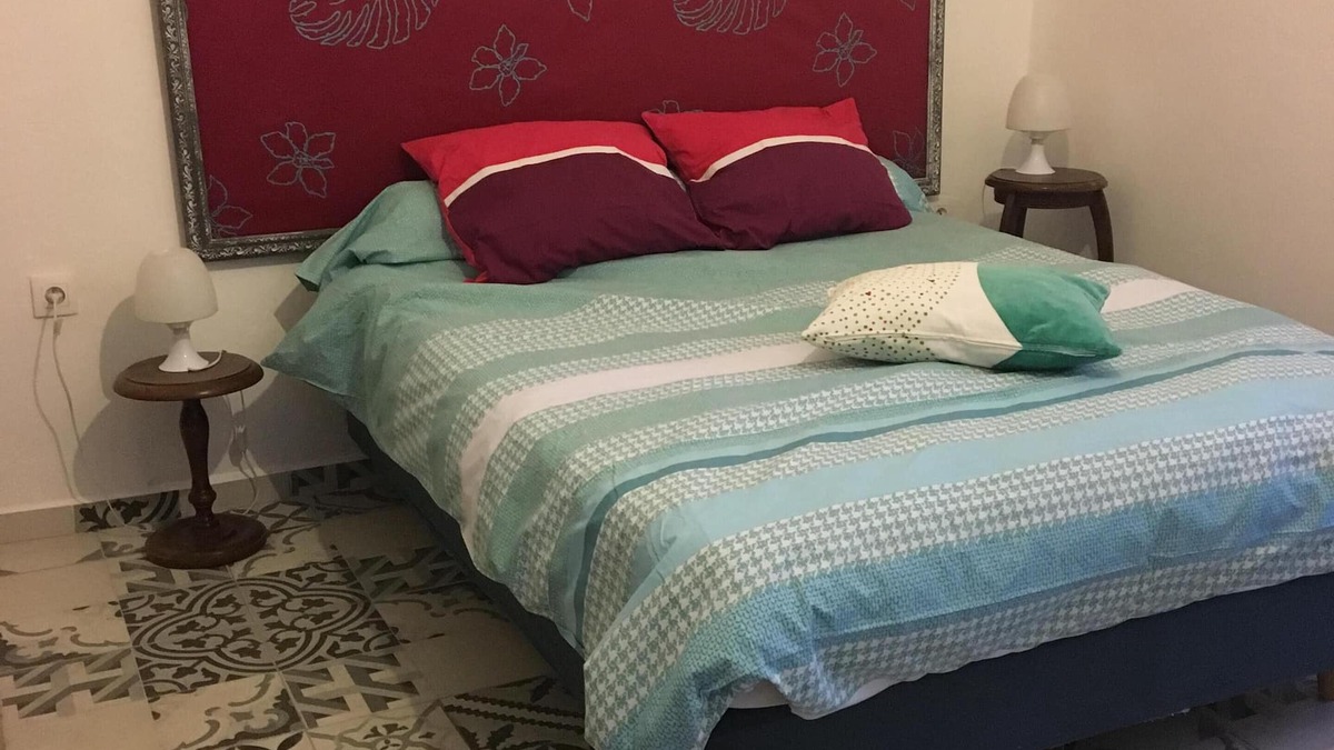Saint-Jean-du-Pin Bed & Breakfast | Bedroom and terrace, overlooking the garden. It can be combined with the gîte.