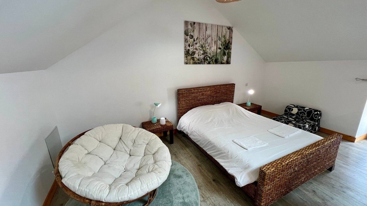 Lussac-les-Chateaux Apartment | Bedroom is a cosy house