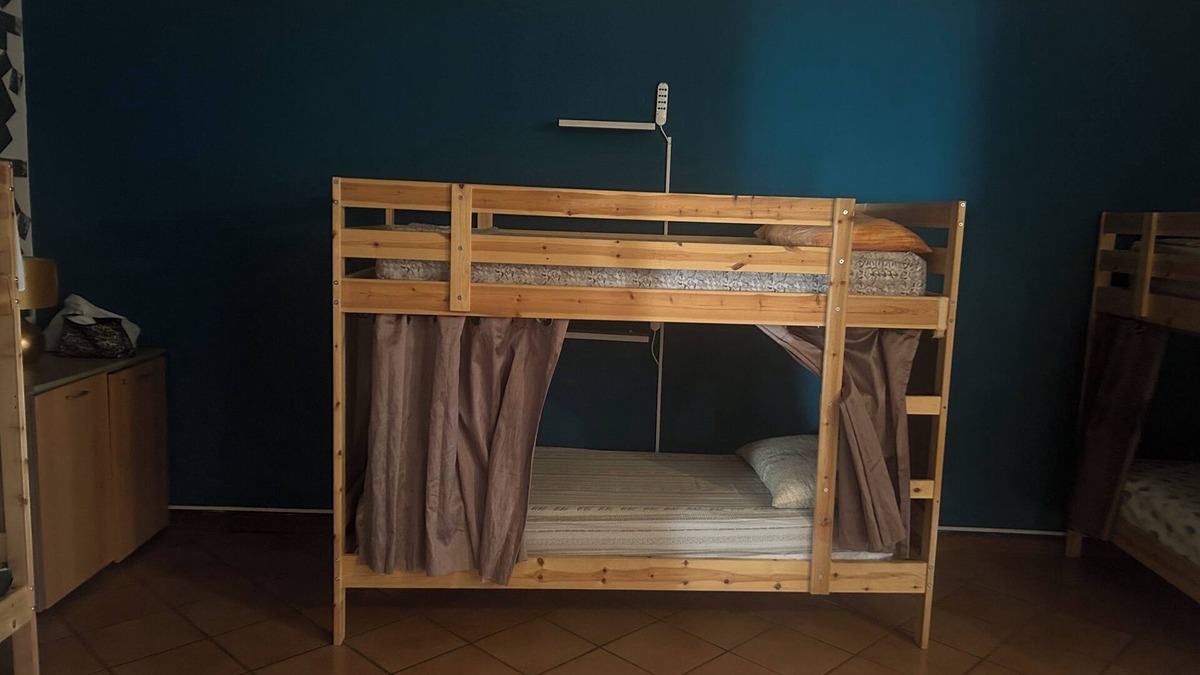 Busto Garolfo House | Beds in shared room