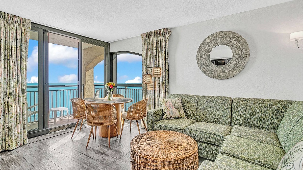 Windy Hill Condo | Best view at Beach Cove- Tropical oceanfront corner condo with double balcony!