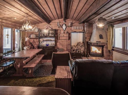 Auktsjaur House | Blockhaus am See