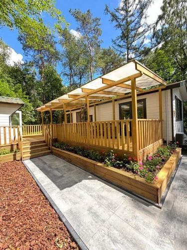 Municipality of Elburg Ski Chalet | Bosrijk chalet Veranda, Honden