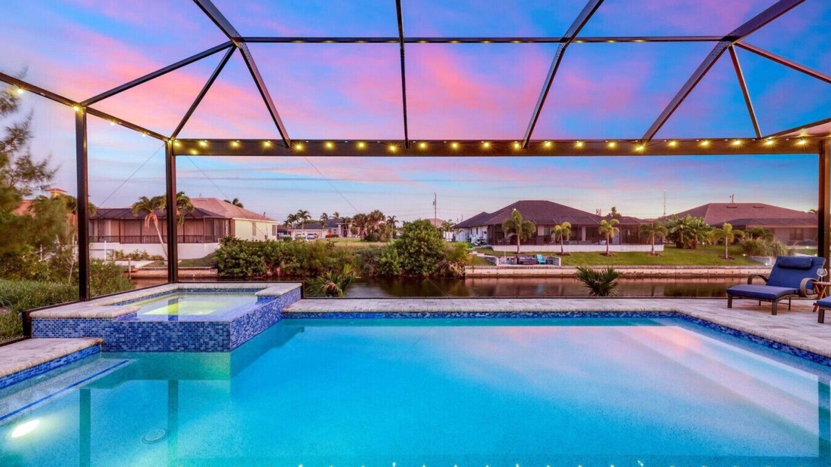Pelican House | BRAND NEW- Gulf access electric heated pool home sleeps up to 13 guests