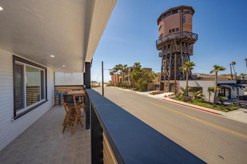 Sunset Beach House | Brand New Home by the Beach & Historic Sunset Water Tower