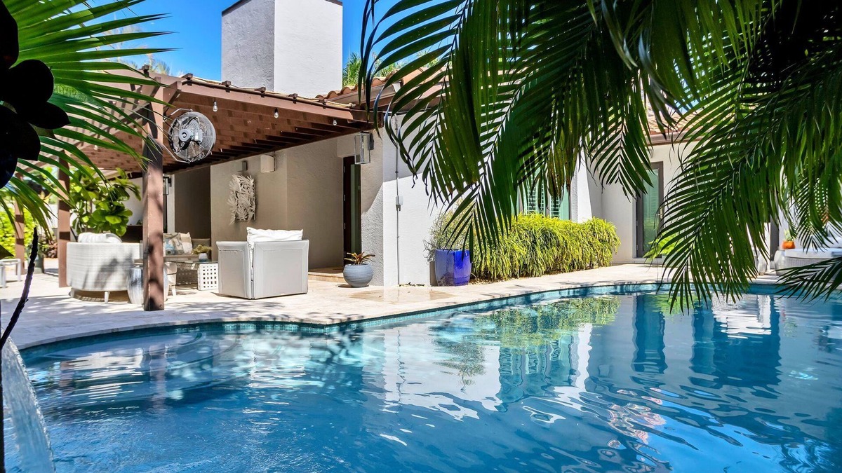 Dolphin Isles House | Breathtaking Oasis, Steps to Beach, Heated Pool, In-ground Spa VIRTUAL TOUR