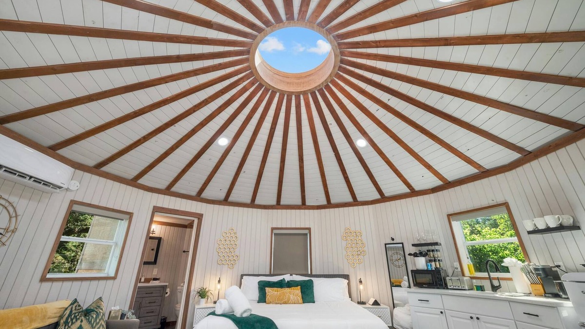 Dripping Springs Cabin | Breathtaking Treehouse Yurt! King Bed and Spa!