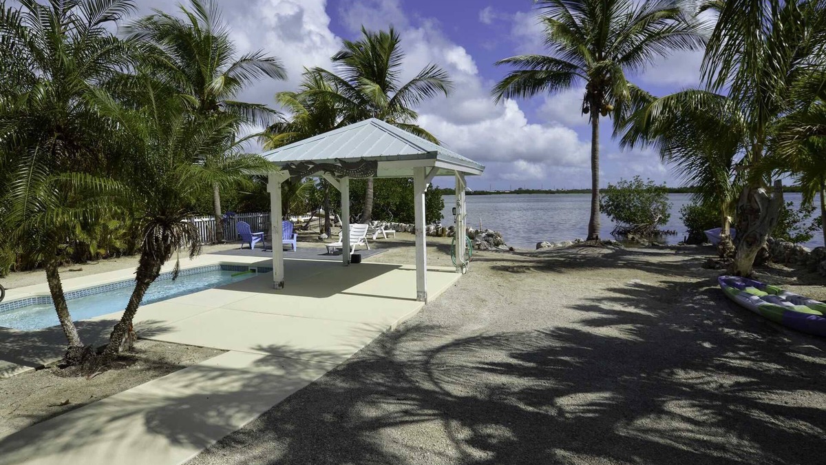 Ramrod Key House | Breezeswept Beach, Waterfront with heated pool
