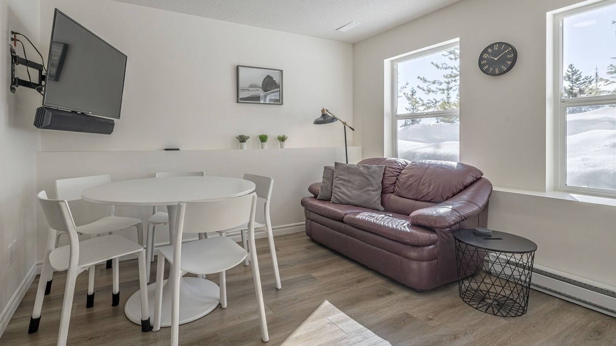 Silver Star Mountain Apartment | Bright 1 Bedroom Plus Private Den - modern suite with BBQ, pet friendly!