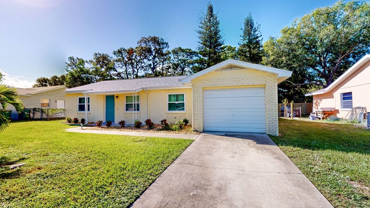 West Melbourne House | Bright dog-friendly house with screened patio - beach & golf nearby