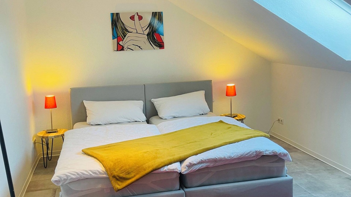 Karthause Condo | Bright, spacious attic apartment.