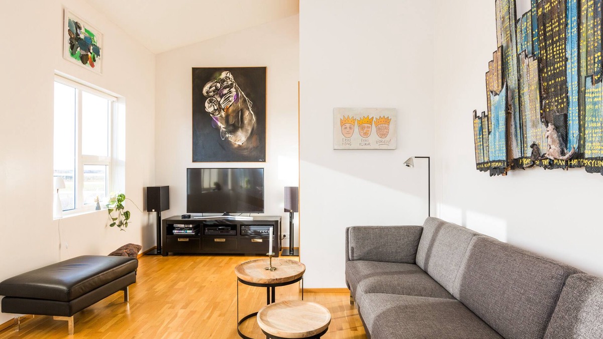 Stokkseyri Apartment | Bright & stylish flat with modern art, big balcony & hot tub. Family friendly.