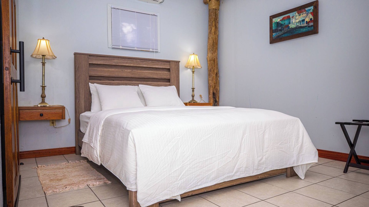 Belize City House | Bze Nature Nook – 2 Private 1BR Suites, Lagoonfront, Gated, 10 Min from Airport