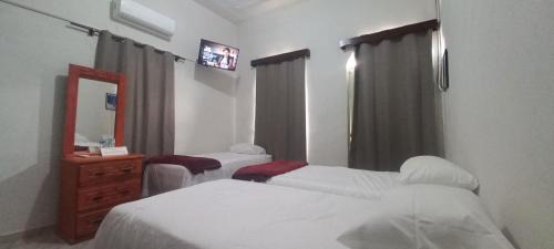 Zona Centro Apartment | Céntrica habitación con balcón para 3 personas con baño exclusivo en pasillo