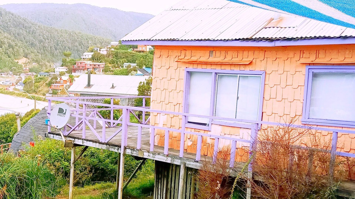 Bahia Mansa Cabin | Cabaña Maicolpue Rio Sur has a large terrace with beautiful ocean view.