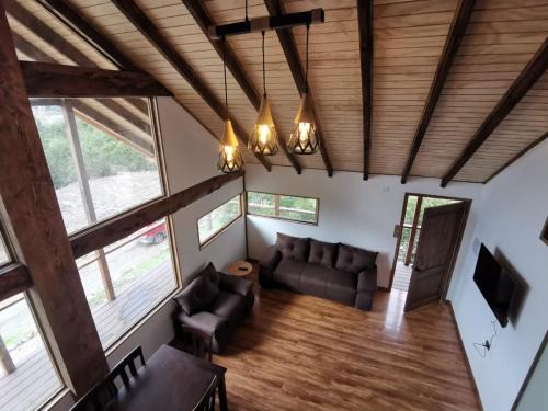 Puerto Aysen Bed & Breakfast | Cabaña monte rio