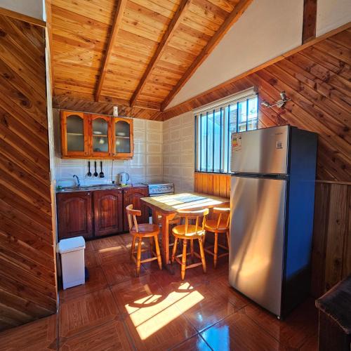 Lican Ray House | Cabañas y Tinajas Borde río