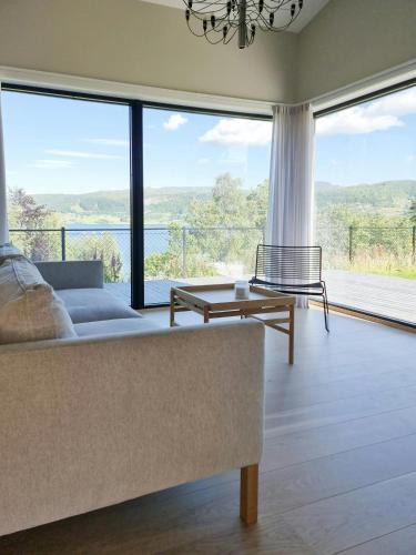 Hjelmeland House | Cabin By The Fjord With Rooftop Terrace On Randøy