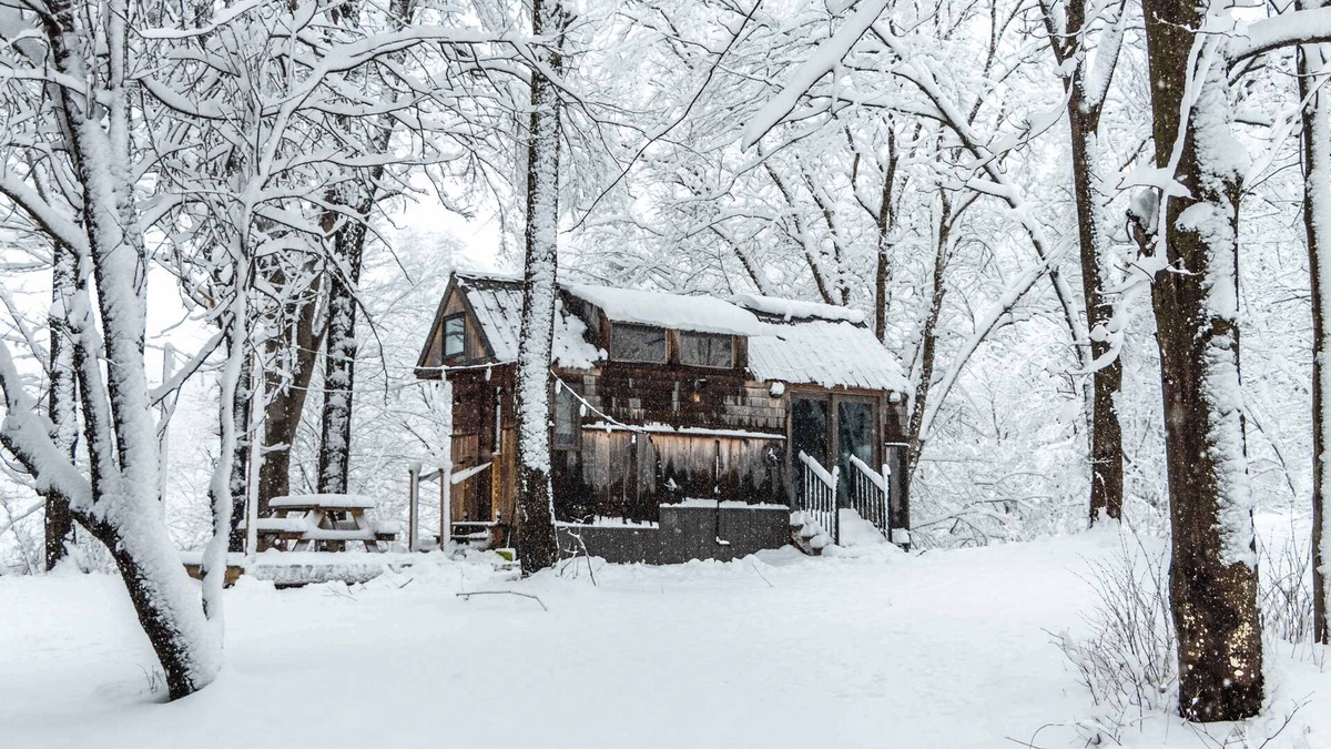 Johnson House | Caboose Tiny Home on river with hot tub near Stowe