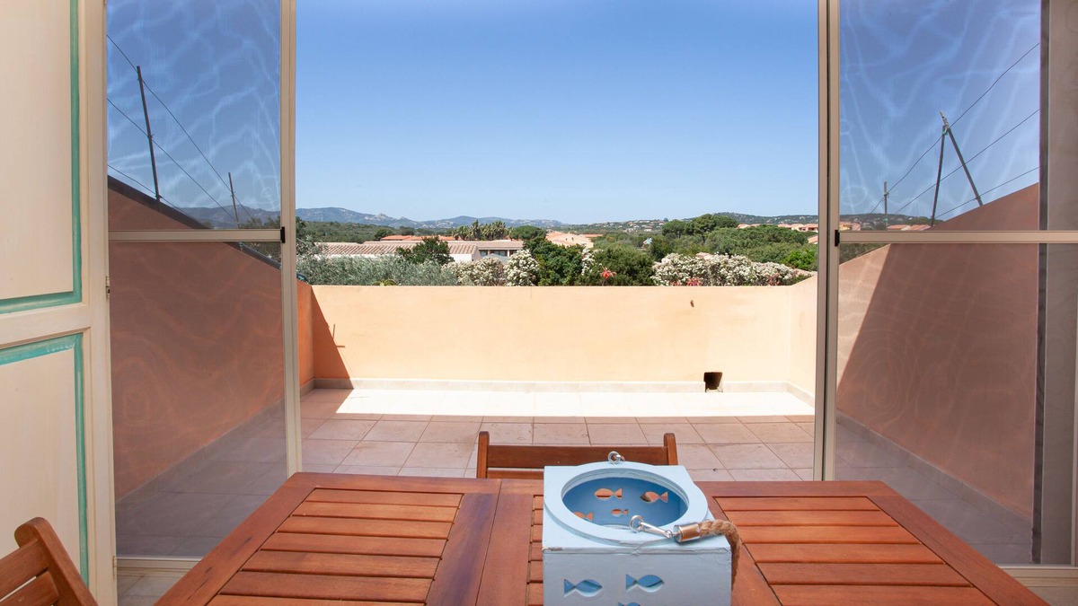 Capo Coda Cavallo Apartment | [★★★★★ Cala Brandinchi] Beach House with Terrace, Free Parking, Free WiFi