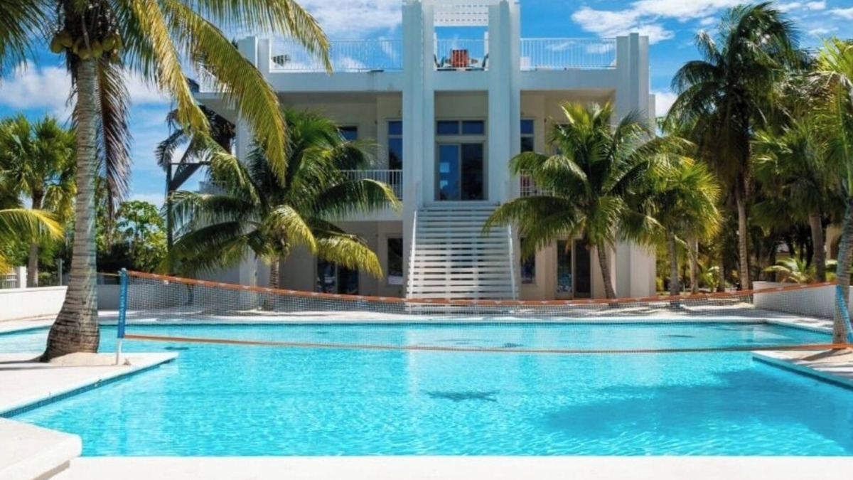 Sandy Point House | Calm Waters - A Luxury Beachfront Private Villa. No Crowds. Just Ocean.
