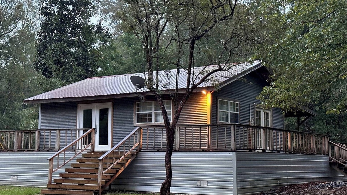 Perkinston Cabin | Camp House on Red Creek - Uncle Ralph’s Cabin Rentals - PRIVATE BEACH