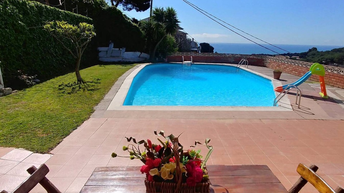 Mataro House | Can Carrion a large pool overlooking the sea