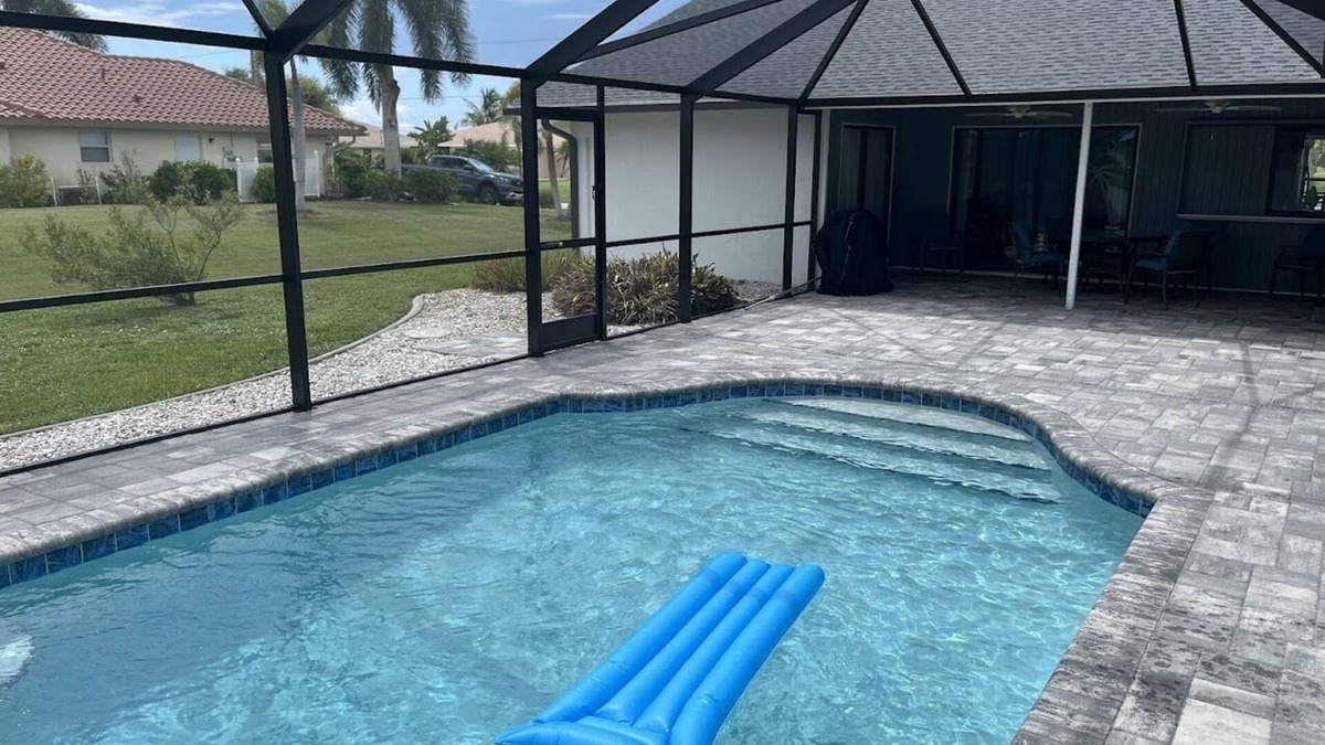 Pebble Beach House | Canal-front home with private pool, grill, patio, AC, W/D & gorgeous views