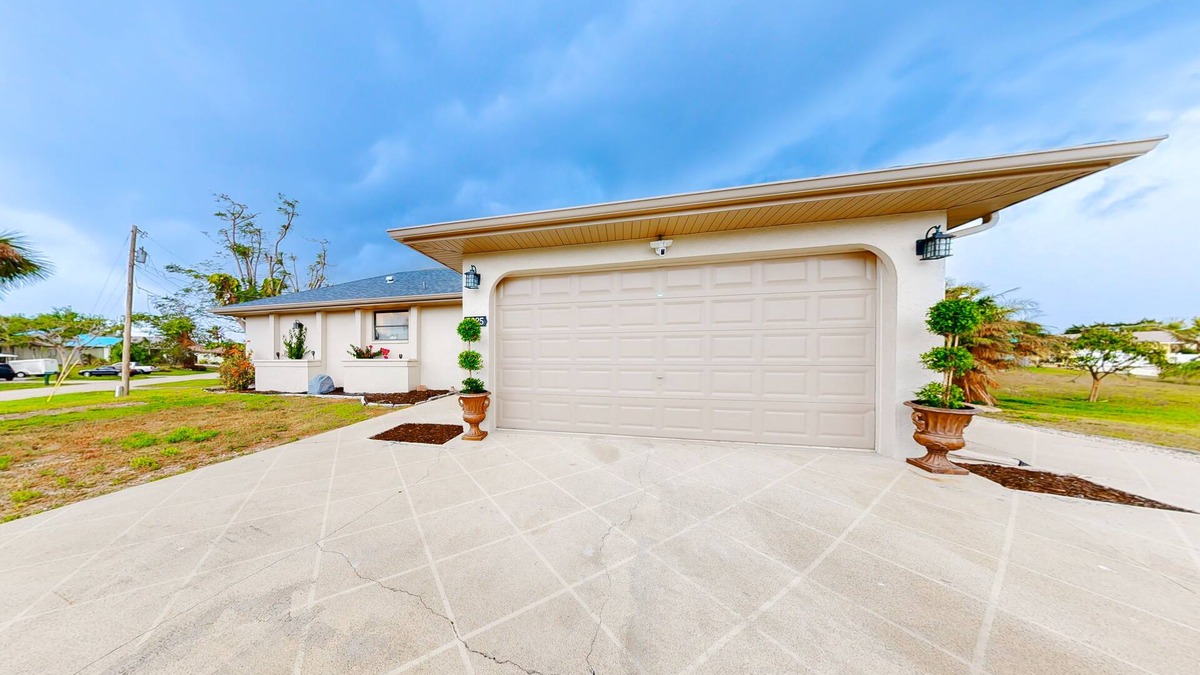 Charlotte Park House | Canal-front home with private dock, pool, screened lanai, & W/D
