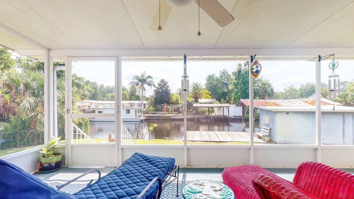 Astor House | Canal-Front Home with Private Covered Boat Dock & Waterfront Screened Porch