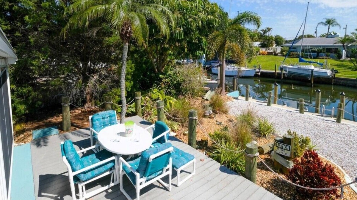Bayshore Gardens House | CANAL FRONT W/DOCK, Water View, Dock your Boat, Free WIFI Dog - See Note.