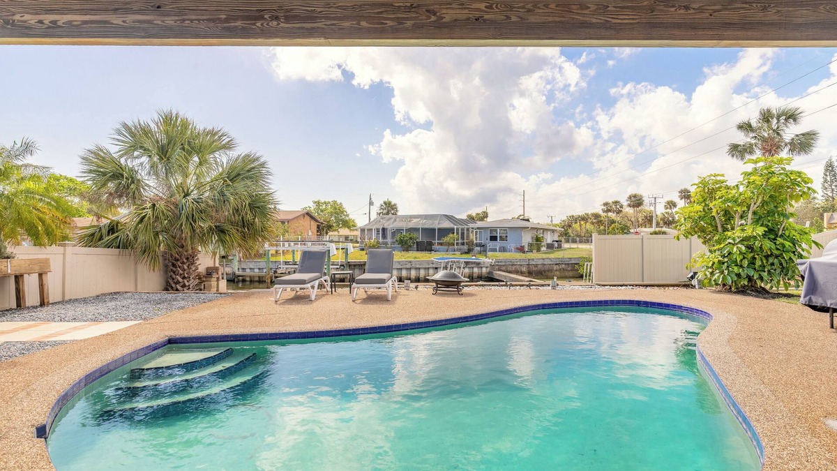 South Daytona House | Canal waterfront newly remodeled 2 bedroom guest suite with pool, patio and dock