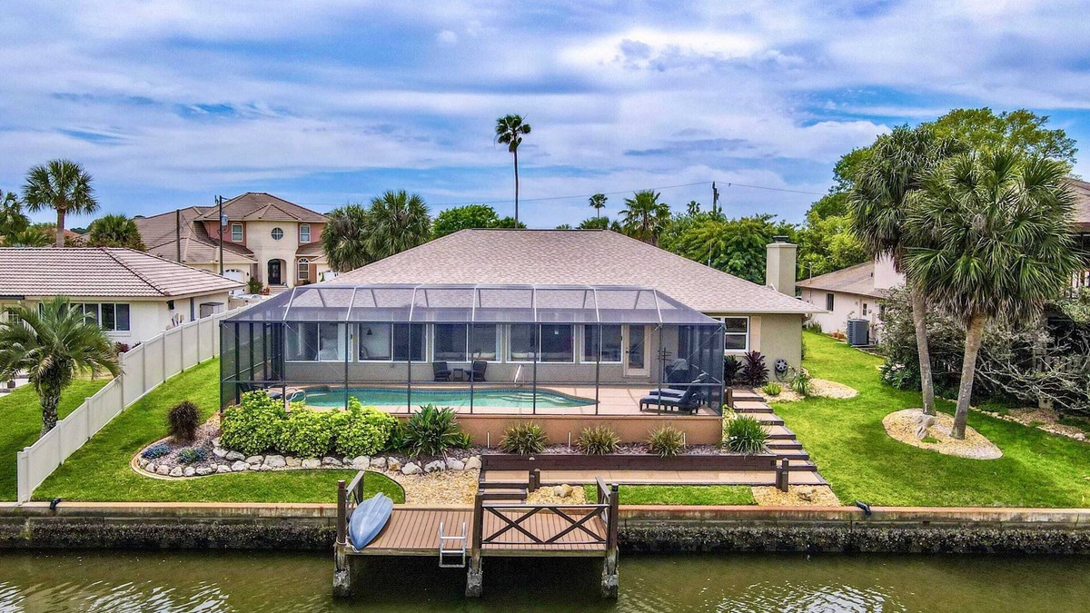 Palm Harbor House | Canalfront with Pool Kayaks Bikes & Boat Access