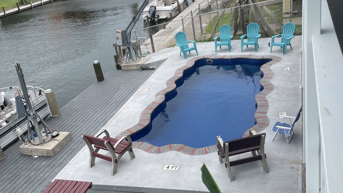 City-by-the Sea House | Captains Quarter/canal front, private pool, dock for two boats.