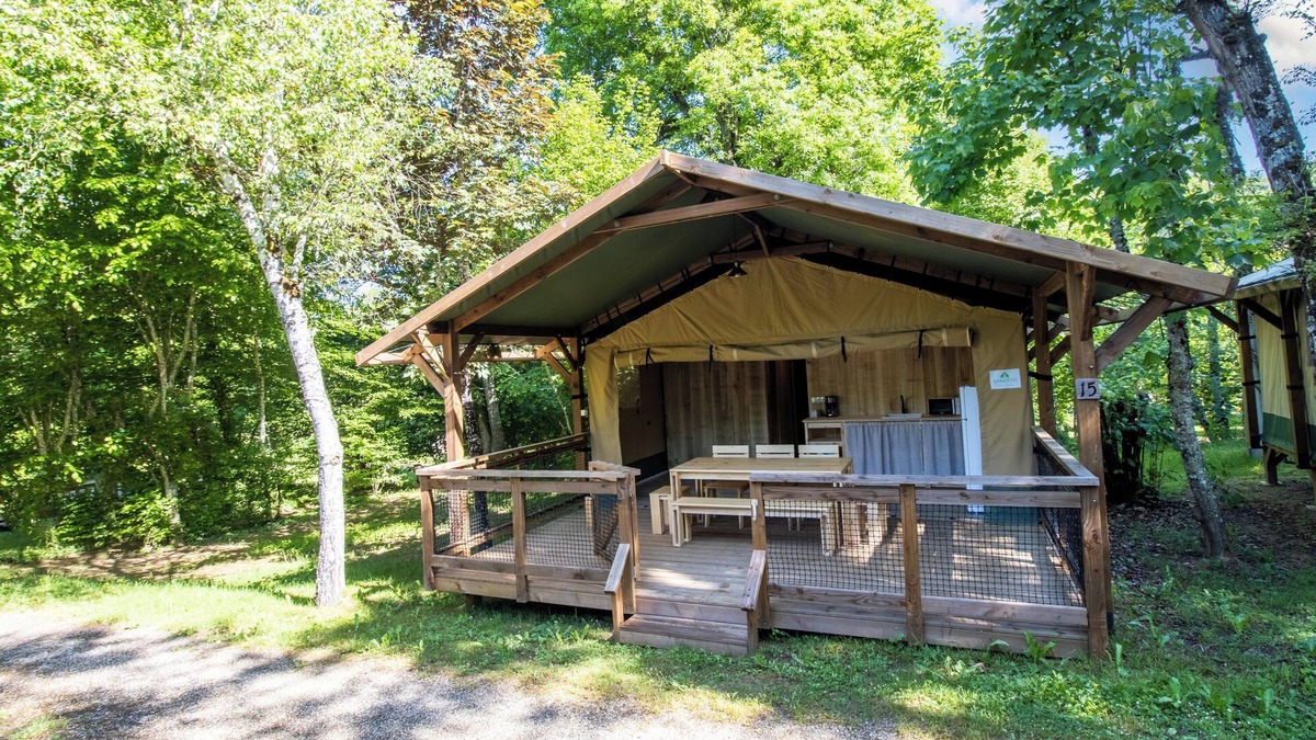 Saint-Martial-de-Nabirat RV Rental | Caravan 'Tente Lodge' with Shared Pool, Private Terrace and Wi-Fi