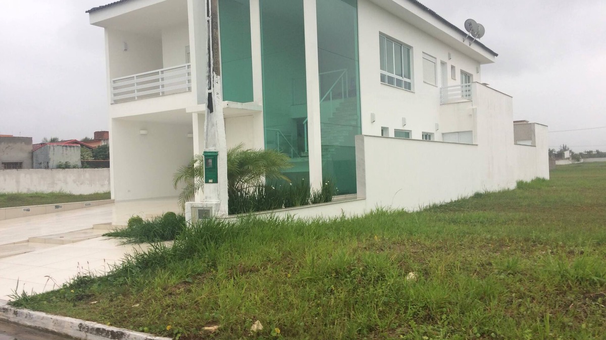 Tupy House | Casa com Piscina em Condomínio Fechado com Segurança 24h de Frente Para o mar