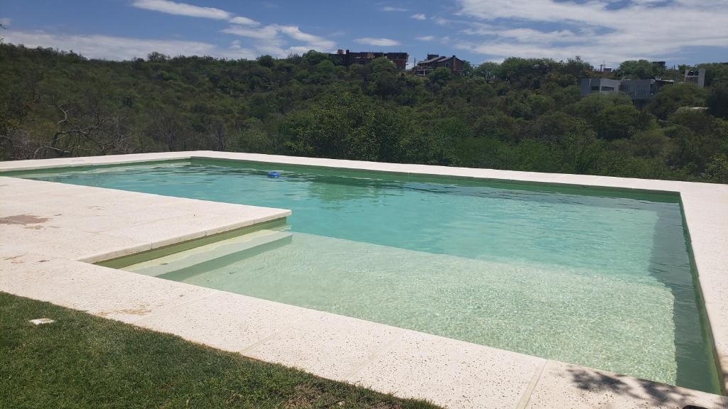 Yocsina House | Casa con pileta en barrio privado