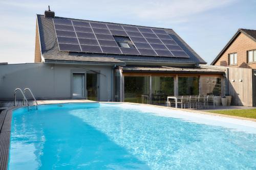 Vleteren House | Casa Jacaranda