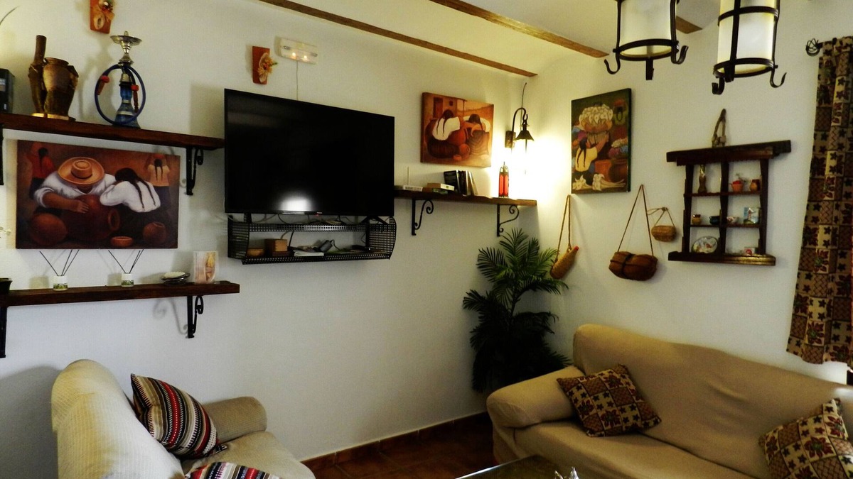 Cuevas del Campo House | Casa Triana with Mountain View, Shared Pool, Terrace & Wi-Fi