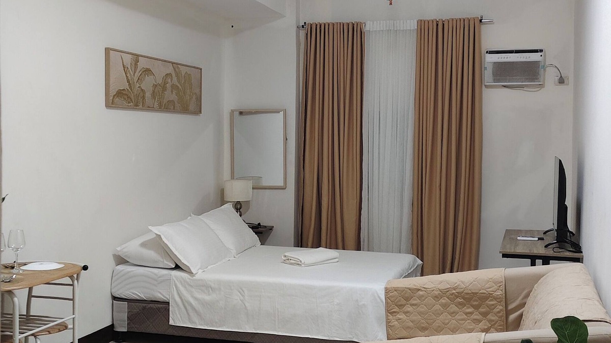 North Reclamation Area Condo | Cebu San Marino Residences- Deluxe Room