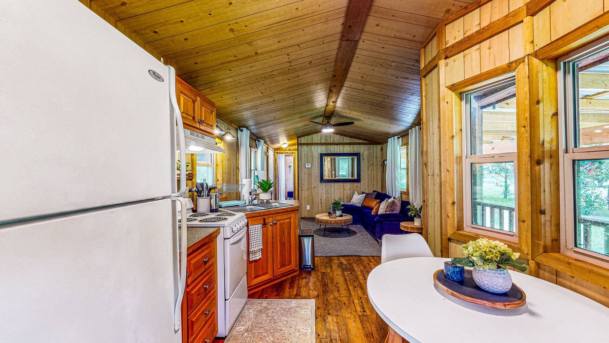 Waller Cabin | Cedar cabin with pretty pond, beach, swimming deck & tropical hut/bar