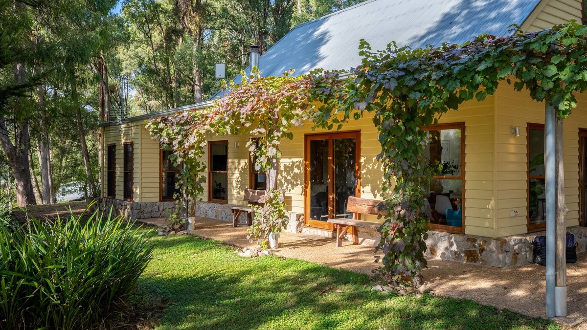 Wandiligong House | Centenary Heights - Boasting commanding views of the surrounding bushland and rolling hills of Wandiligong .