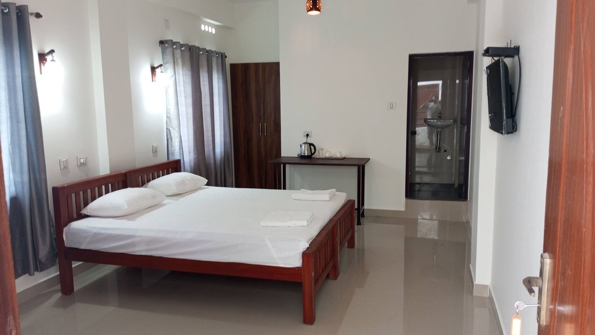Angamali Hotel | CHAEL Airport Residency, Double Room Non AC nNedumbassery,Cochin.